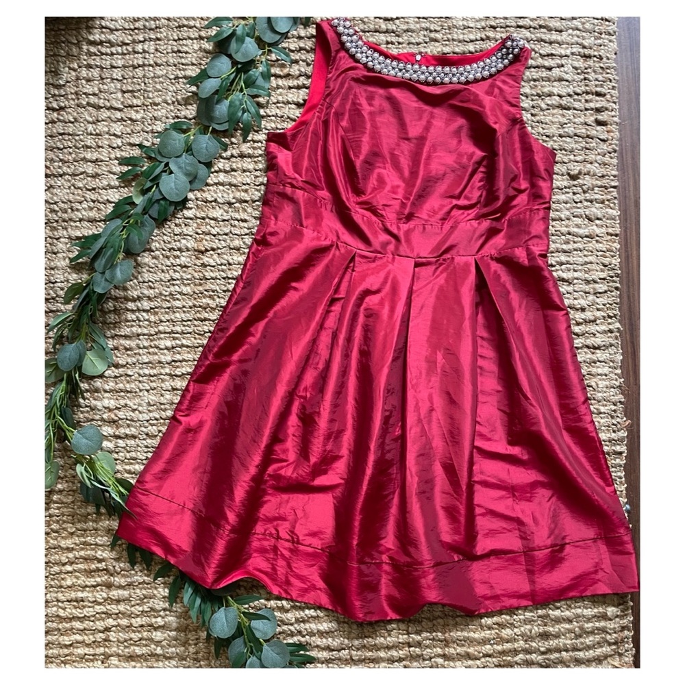 Gorgeous red satin dress with pearl detail in neckline